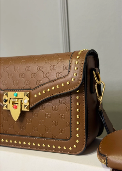 1019- CARRIEL TACHES BROWN