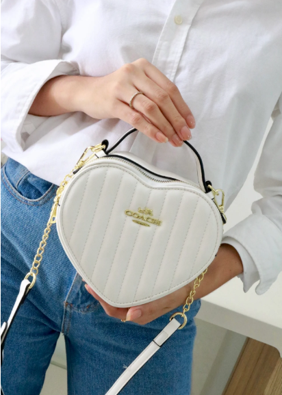 2030-COACH CORAZÓN RELIEVE BLANCO