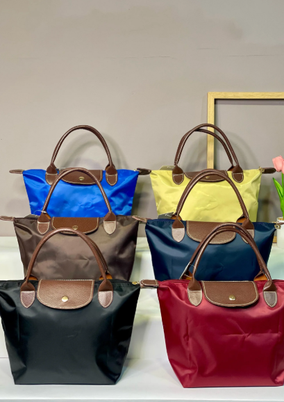 RA-03 “TALLA M” BOLSO LONA DORADO