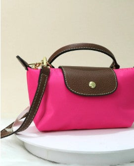 RA-04 MINI BAG LONA-ROSADO FUCSIA